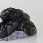 Gorgeous carving of an Inuit woman fishing by Adamie Inukpuk