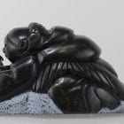 Gorgeous carving of an Inuit woman fishing by Adamie Inukpuk