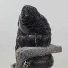 Wonderful carving of a man fishing by an unknown Inuit artist