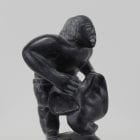 Wonderful carving of a man dressing by an unknown Inuit artist