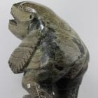 Striking carving called Shaman and Spirits by Palaya Qiatsuq, an Inuit artist from Cape Dorset