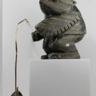 Striking carving called Shaman and Spirits by Palaya Qiatsuq, an Inuit artist from Cape Dorset