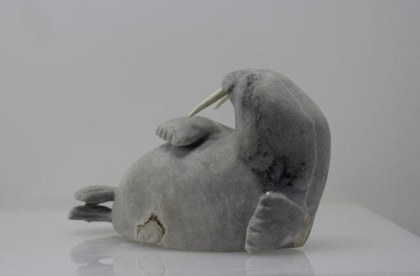 Stunning grey walrus carved by Bart Hanna