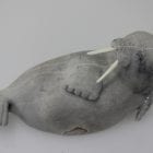 Stunning grey walrus carved by Bart Hanna