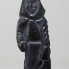 Man with seal, carved by Bobby Aupaluktuk, an Inuit artist from Inukjuak