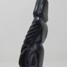 Man with seal, carved by Bobby Aupaluktuk, an Inuit artist from Inukjuak