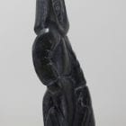 Man with seal, carved by Bobby Aupaluktuk, an Inuit artist from Inukjuak