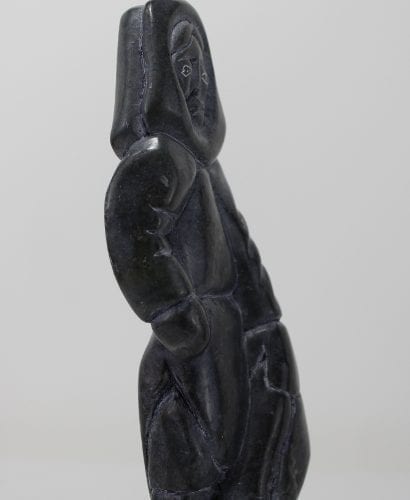 Man with seal, carved by Bobby Aupaluktuk, an Inuit artist from Inukjuak