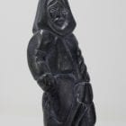 Man with seal, carved by Bobby Aupaluktuk, an Inuit artist from Inukjuak