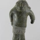 Man carved from beautiful stone by Inuit artist Ineak Padluq, an artist from Lake Harbour