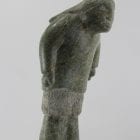 Man carved from beautiful stone by Inuit artist Ineak Padluq, an artist from Lake Harbour