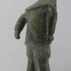 Man carved from beautiful stone by Inuit artist Ineak Padluq, an artist from Lake Harbour