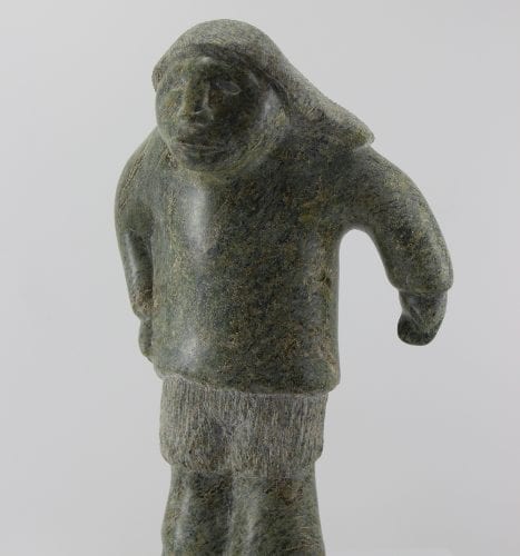 Man carved from beautiful stone by Inuit artist Ineak Padluq, an artist from Lake Harbour