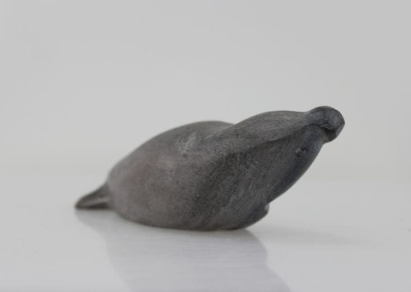 Grey seal carved by Sanikiluaq artist Johnassie Uppik.