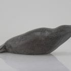 Grey seal carved by Sanikiluaq artist Johnassie Uppik.