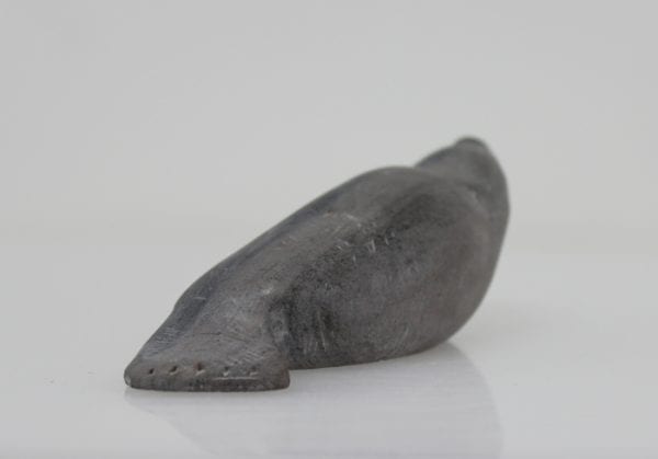 Grey seal carved by Sanikiluaq artist Johnassie Uppik.