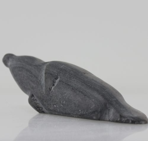 Grey seal carved by Sanikiluaq artist Johnassie Uppik.