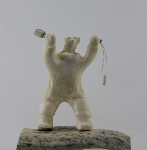 Shaman Bear by Louie Makkituq is a phenomenal carving in cream stone. A striking piece.