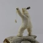 Shaman Bear by Louie Makkituq is a phenomenal carving in cream stone. A striking piece.