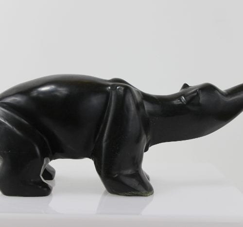 Wonderful, stylized carving of a bear by an unknown artist from Hopedale, Labrador.