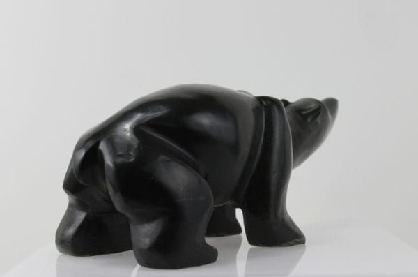 Wonderful, stylized carving of a bear by an unknown artist from Hopedale, Labrador.