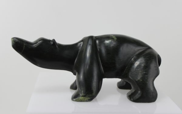 Wonderful, stylized carving of a bear by an unknown artist from Hopedale, Labrador.