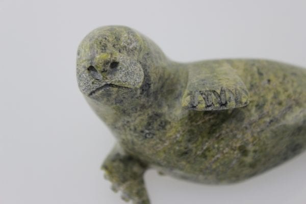 Seal carved by Inuit artist Lyta Josephie, an artist from Iqaluit