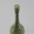 Beautiful green bird with elegant lines carved by Mark Pitsiulak, an artist from Kimmirut.