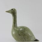 Beautiful green bird with elegant lines carved by Mark Pitsiulak, an artist from Kimmirut.