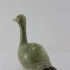 Beautiful green bird with elegant lines carved by Mark Pitsiulak, an artist from Kimmirut.