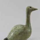 Beautiful green bird with elegant lines carved by Mark Pitsiulak, an artist from Kimmirut.