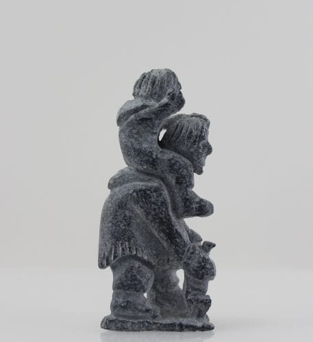 Charming carving of a father and son by Igloolik artist Luke Taqqaugaq.