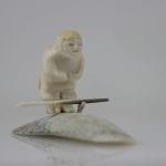 Gorgeous bone and Ivory hunter carved by Maria Kukkurak, an Inuit artist from Kugaaruk.