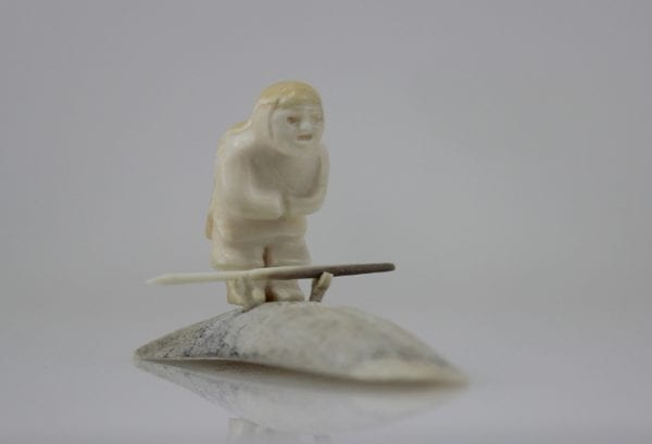 Gorgeous bone and Ivory hunter carved by Maria Kukkurak, an Inuit artist from Kugaaruk.