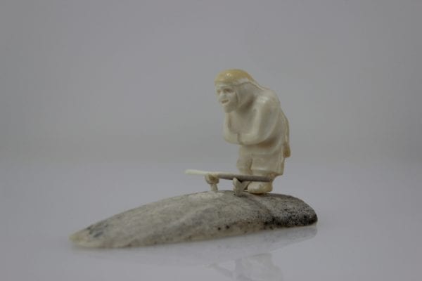 Gorgeous bone and Ivory hunter carved by Maria Kukkurak, an Inuit artist from Kugaaruk.