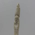 Ivory totem carved by Alexis Milortok, an Inuit artist from Naujaat, Nunavut.