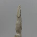 Ivory totem carved by Alexis Milortok, an Inuit artist from Naujaat, Nunavut.