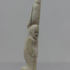 Ivory totem carved by Alexis Milortok, an Inuit artist from Naujaat, Nunavut.