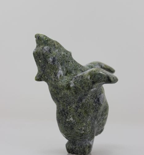 Beautiful dancing polar bear carved in serpentine by Johnny Papigatok