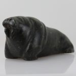 An old carving of a Walrus by Unknown Artist