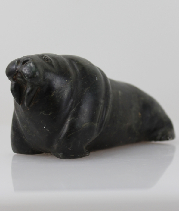 An old carving of a Walrus by Unknown Artist