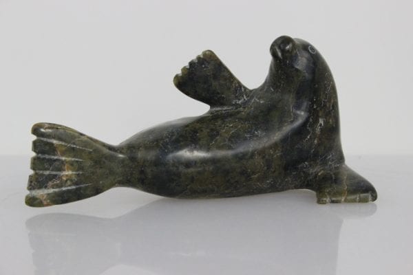 Reclining Seal by Unknown Artist from Cape Dorset -- Kinngait