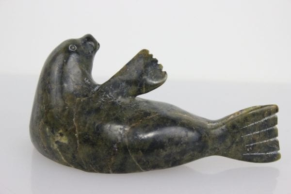 Reclining Seal by Unknown Artist from Cape Dorset -- Kinngait