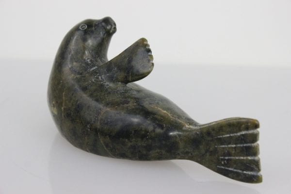 Reclining Seal by Unknown Artist from Cape Dorset -- Kinngait