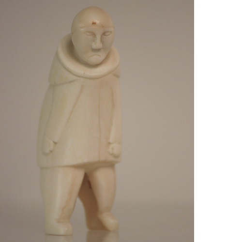 Ivory carving of Man by Etulo from Cape Dorset