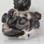 Ceramic Woman with Kudlik by Pierre Aupilardjuk from Rankin Inlet / Kangiqliniq