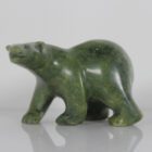 Green serpentine Walking Bear by Quaraq Nungusuituq (ᑯᐊᕋ ᑭᒐᐃ) from Cape Dorset