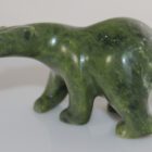 Green serpentine Walking Bear by Quaraq Nungusuituq (ᑯᐊᕋ ᑭᒐᐃ) from Cape Dorset