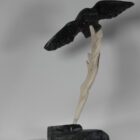 Flying Raven by Isaaci Petaulassie from Cape Dorset