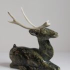 Kneeling Caribou by Sangani Osuitok from Kinngait - Cape Dorset